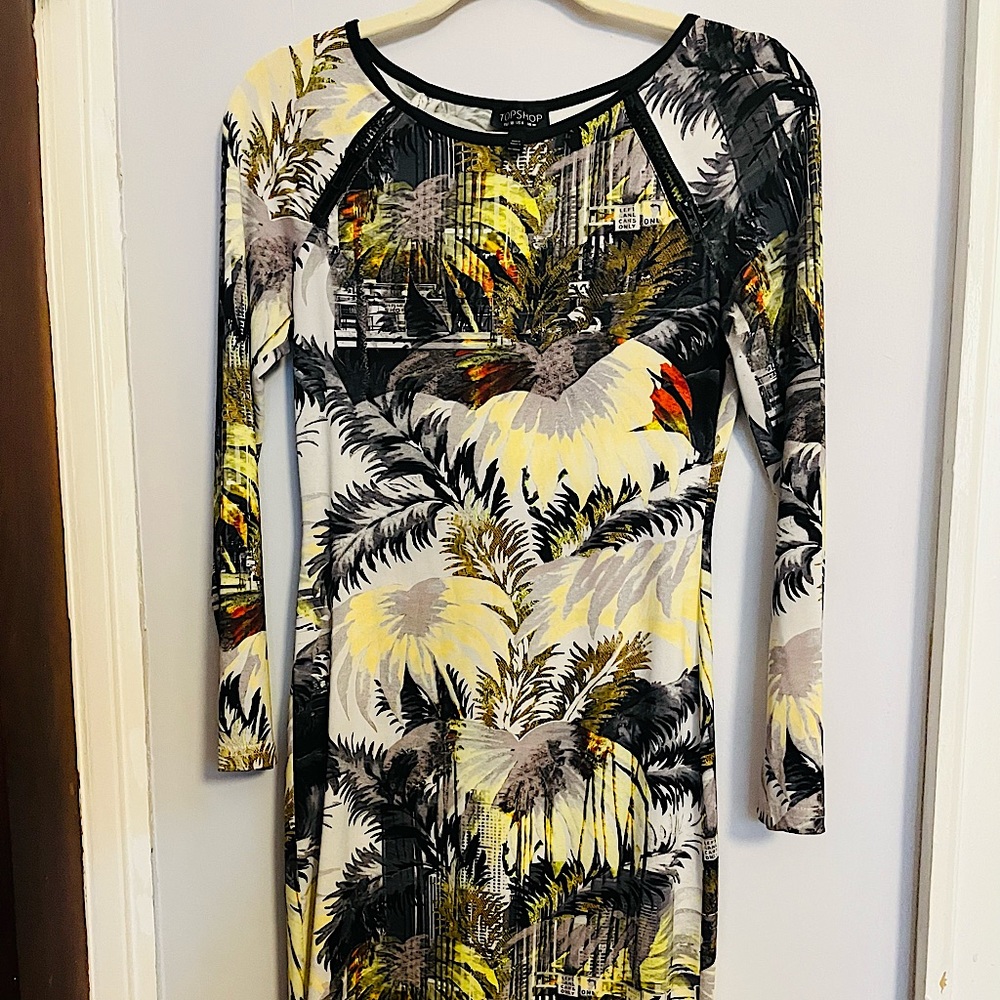 Topshop Tube dress . Just past knee. Really flattering and comfortable